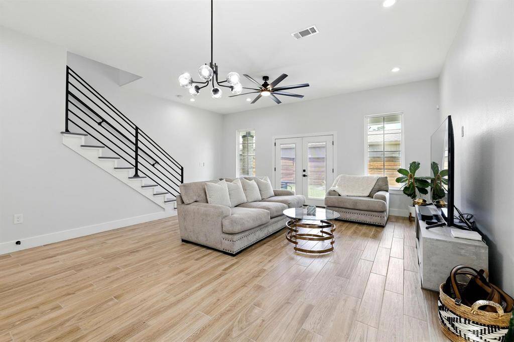 At the heart of the home lies a beautifully designed open-style spacious living room space inviting comfort, with ample room for both relaxing and entertaining.