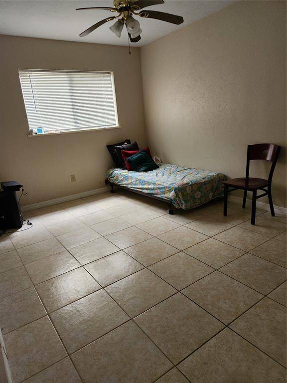 Bedroom with Ceramic Tile Floor.