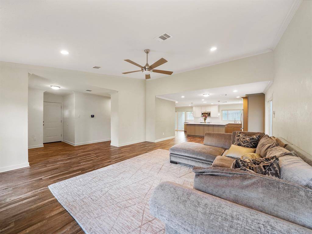 Embrace open-concept living in this stunning home, designed for seamless entertaining.