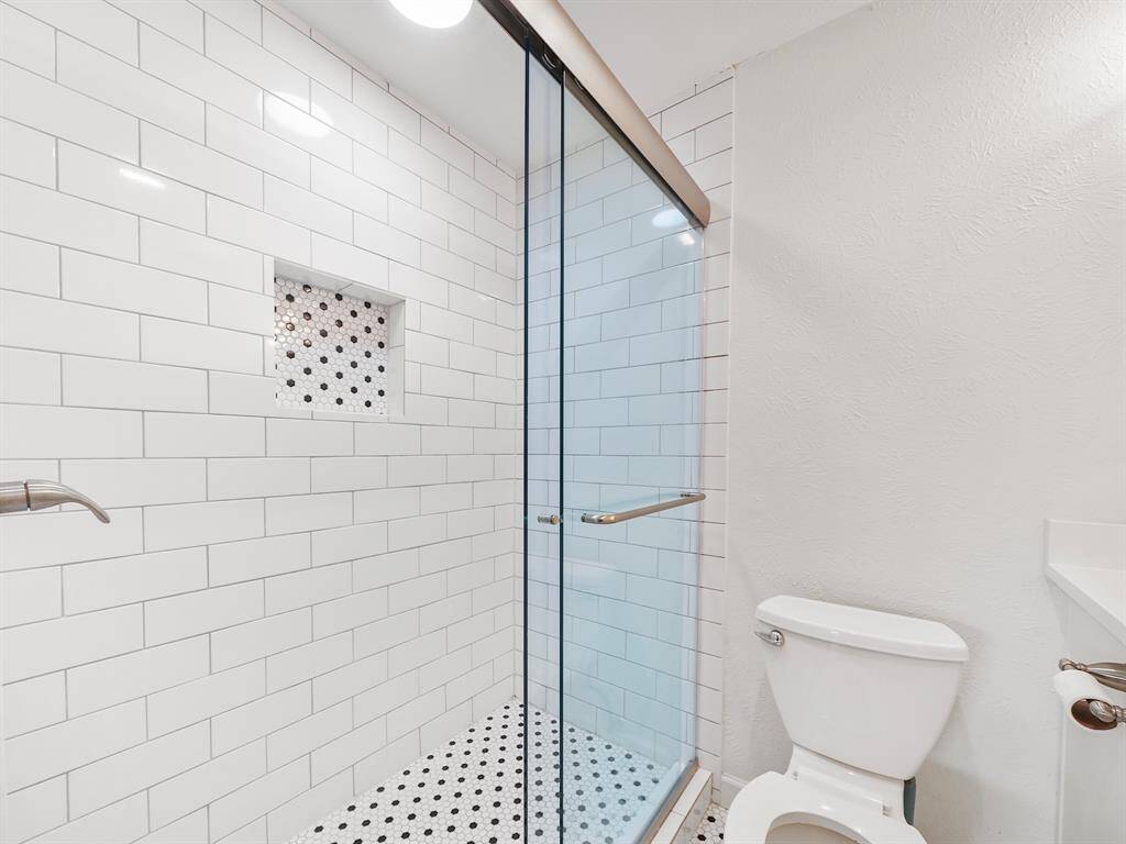Remodeled entire bathroom in the primary suite.