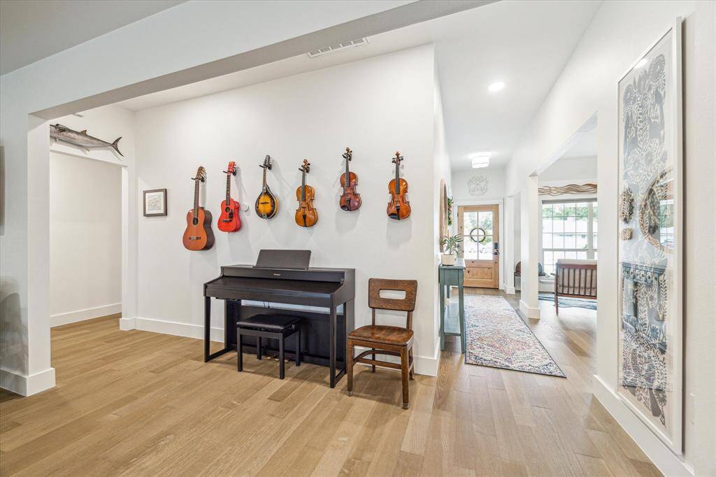 Well-lit, tidy entryway offering a spacious feel.