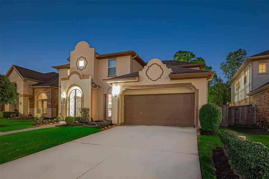 2-car garage with built-in shelving and epoxy floors, Water softener system and sprinkler system!