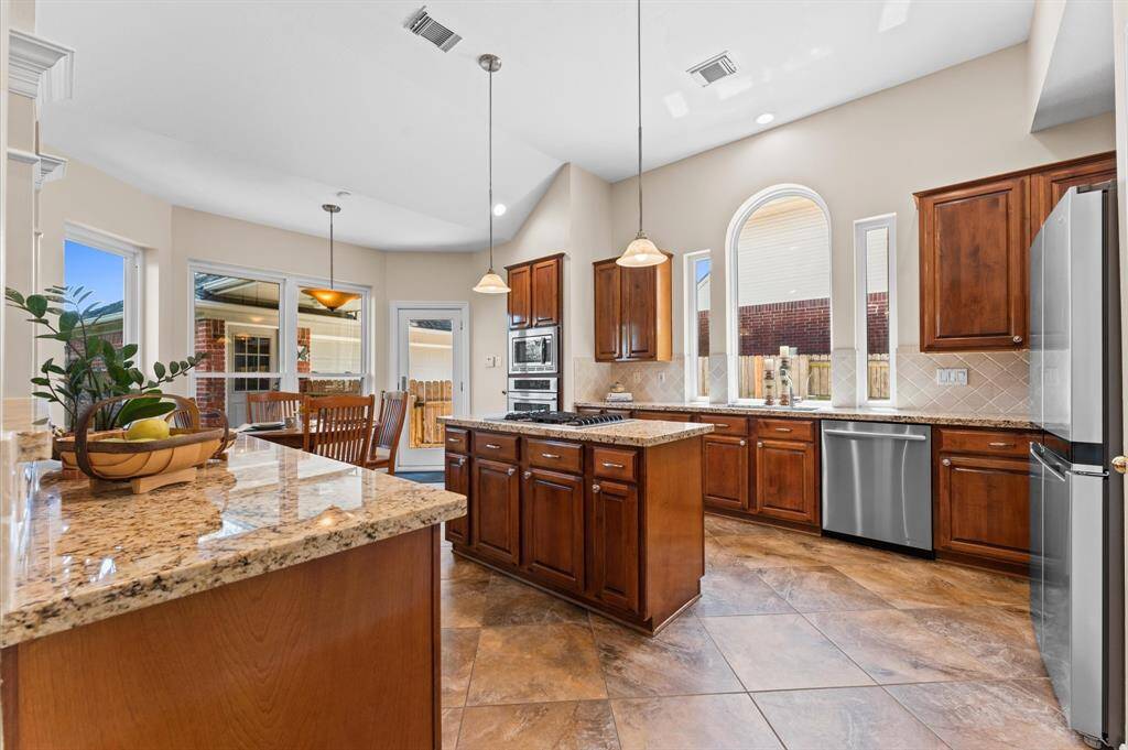 This is a great kitchen layout. It is comfortable for two chefs and has lots of counterspace.