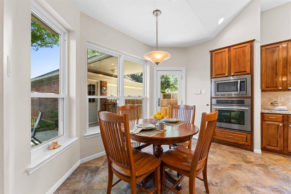 Here you can see the Jenn Air stainless steel appliances. The double paned windows are energy efficiency and don't have view obstructing panes.