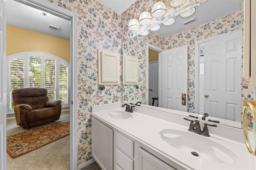 This Hollywood style bathroom has two sinks.