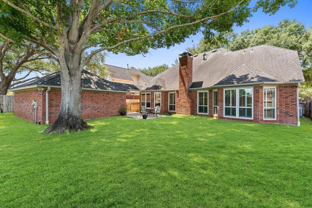 Note the full brick surrounding this house and garage. They don't make them like this anymore!