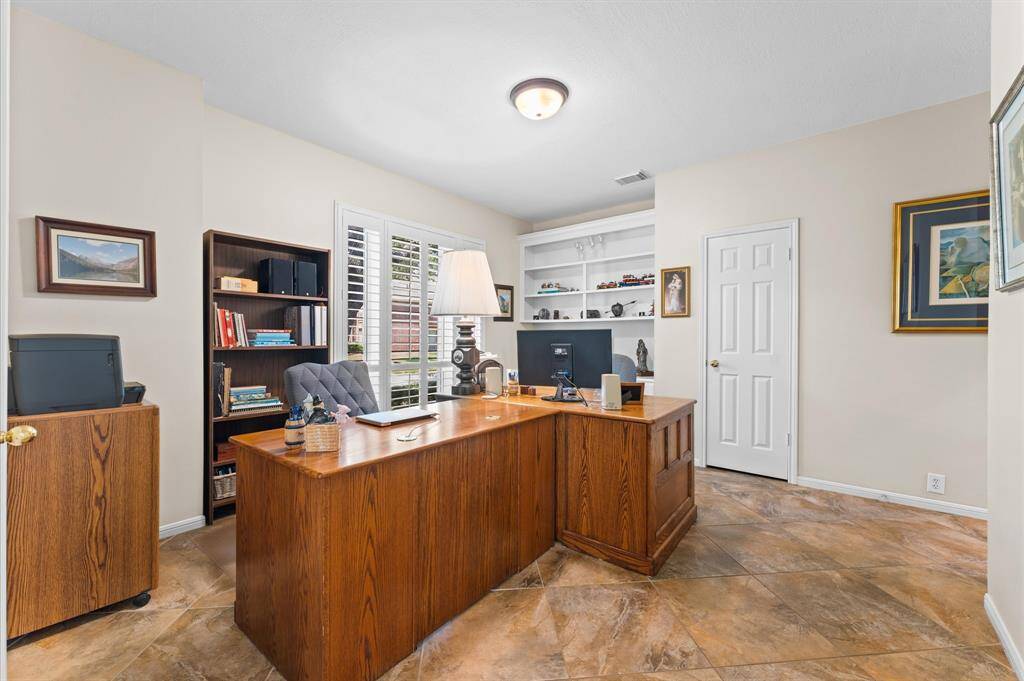 The study has a built in desk on far wall and a small closet. It leads directly to the primary bedroom so is perfect for a nursery or bedroom for an elderly parent who needs care during the night.