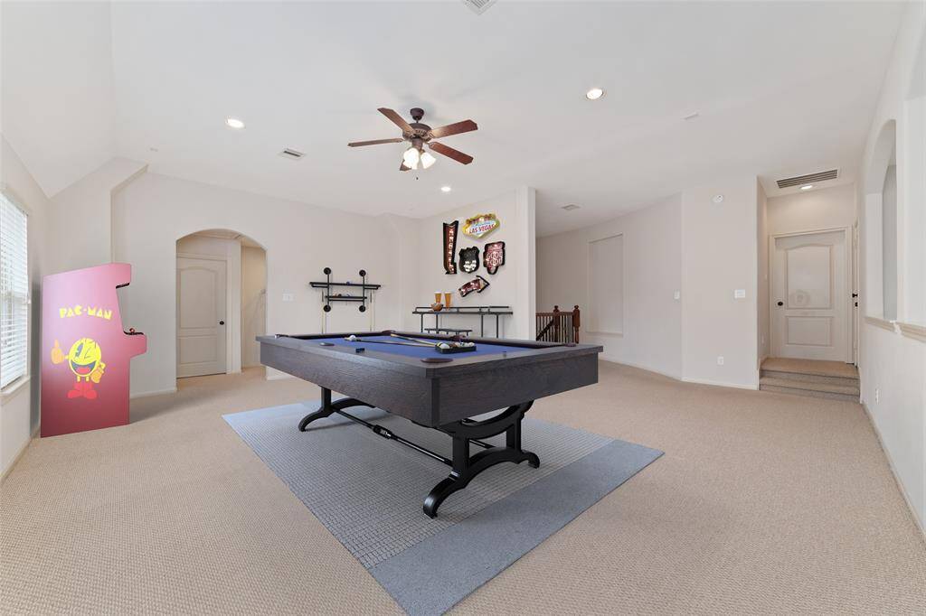 Virtual Staging - Oversized game room upstairs.