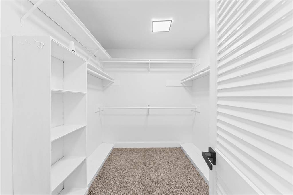 One of the two closets in the primary bedroom