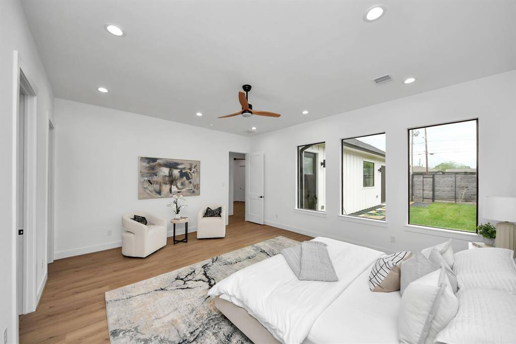 There is plenty of space for a sitting area and large windows grace the room,allowing natural light in!