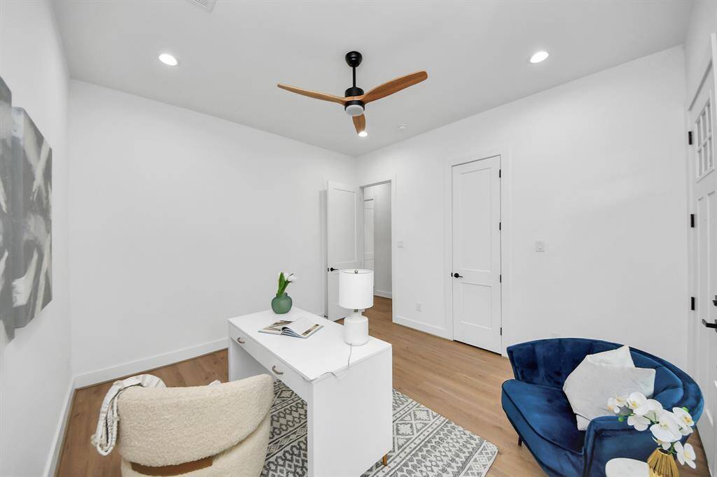 Third bedroom features large windows, ceiling fan, and recessed lighting.