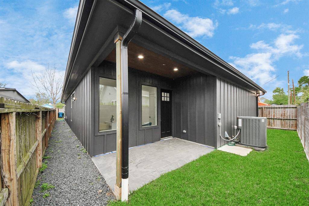 Step into the backyard oasis, with a covered patio, creating aninviting outdoor retreat.