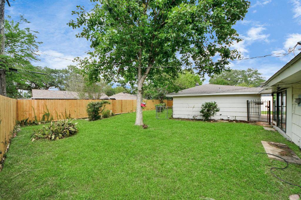 Enjoy a spacious backyard designed for lively BBQs, family fun, or peaceful outdoor relaxation