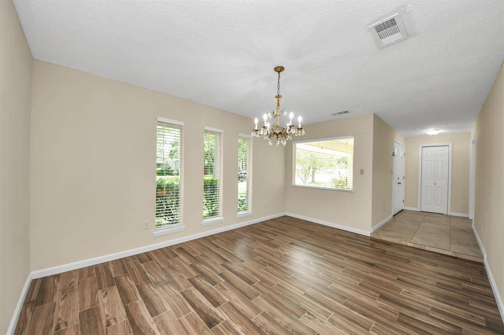 Generously sized dining room ideal for hosting gatherings and special occasions