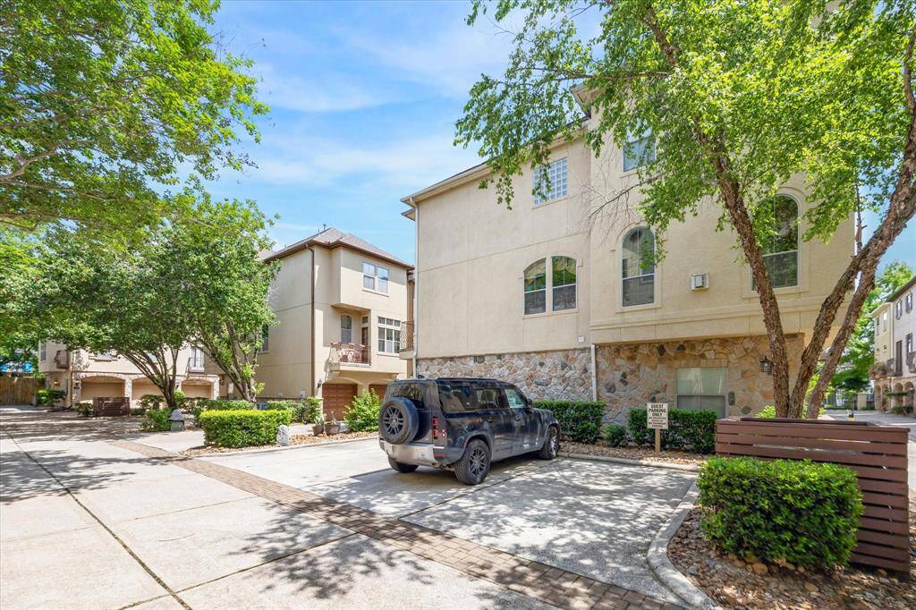 Gated community includes rare dedicated guest parking, offering convenience for visitors without compromising resident access. Manicured landscaping and a wide drive enhance curb appeal and functionality.