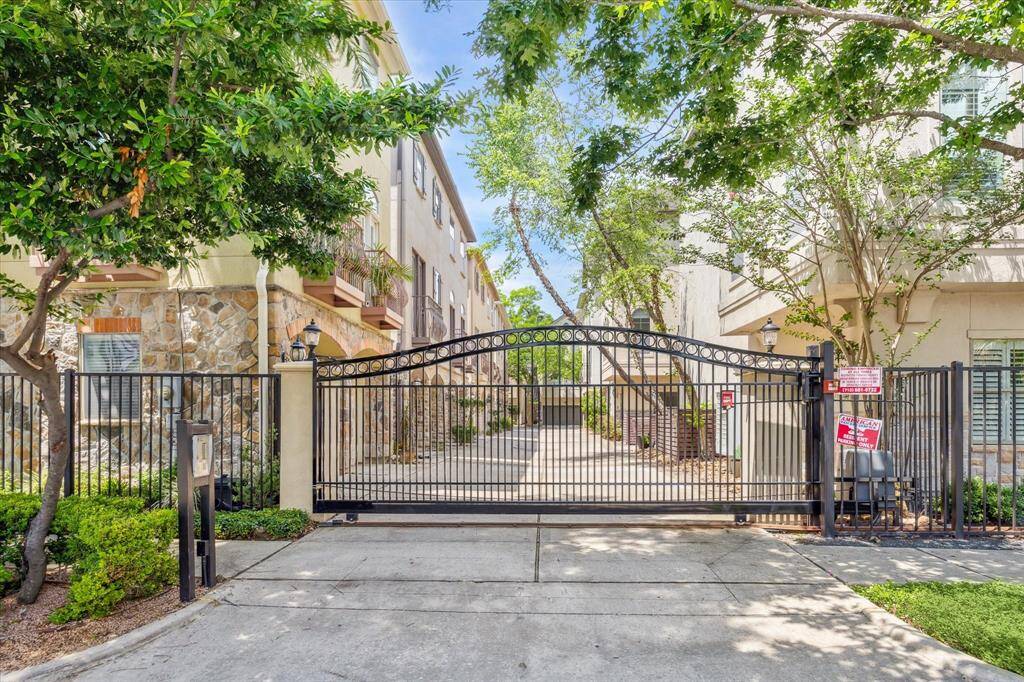 Secure gated entry provides peace of mind and a sense of community, with a well-maintained motor court lined by mature trees and thoughtfully designed landscaping that welcomes you home.