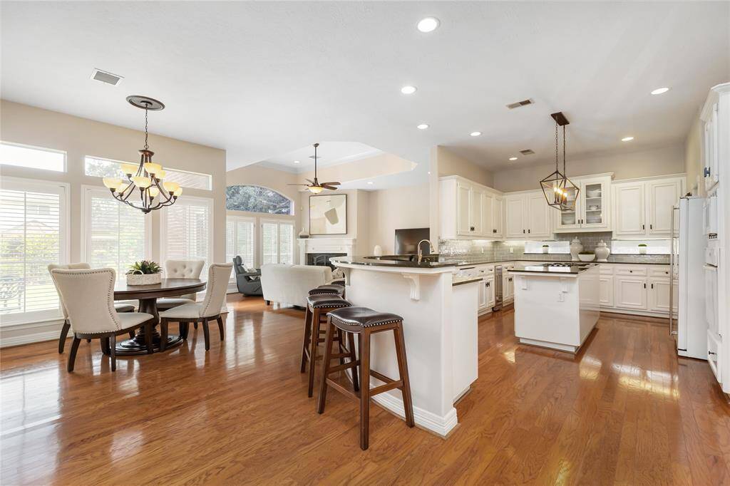 The open floor plan turns the kitchen, breakfast area, and family room into one great living space!