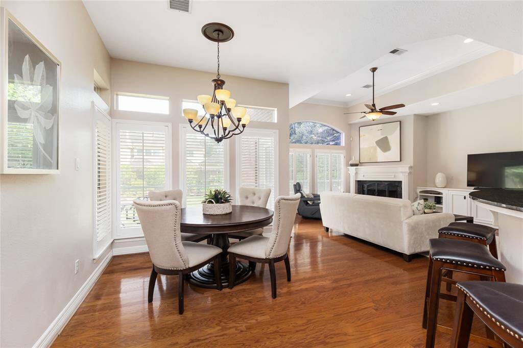 Surrounding the Breakfast Nook are shuttered windows, giving wonderful natural light when you don't want to use to updated chandelier.