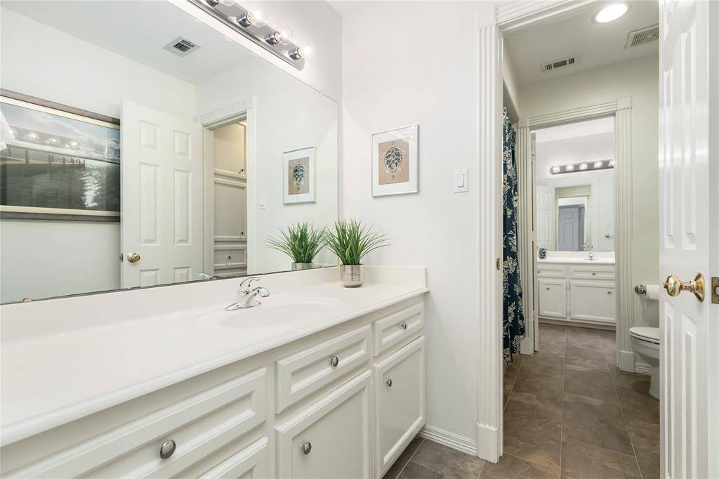 Bathroom leading to third bedroom