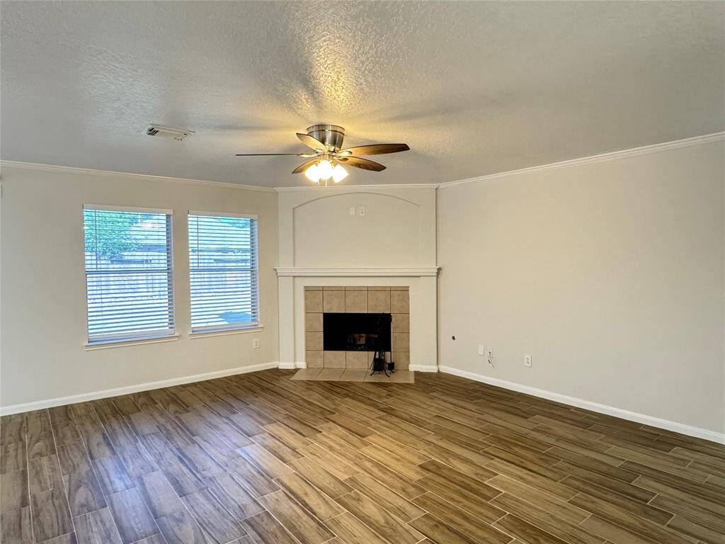 Living room has NEW wood-looking tiles