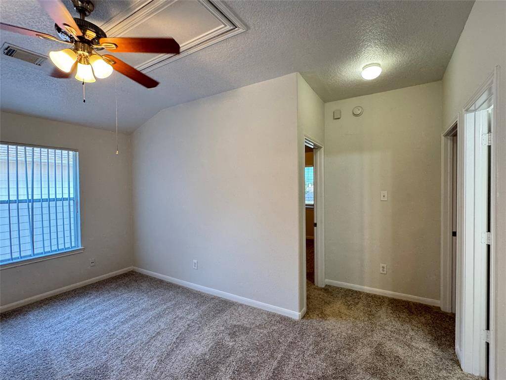 Game room leads to the other 2 bedrooms