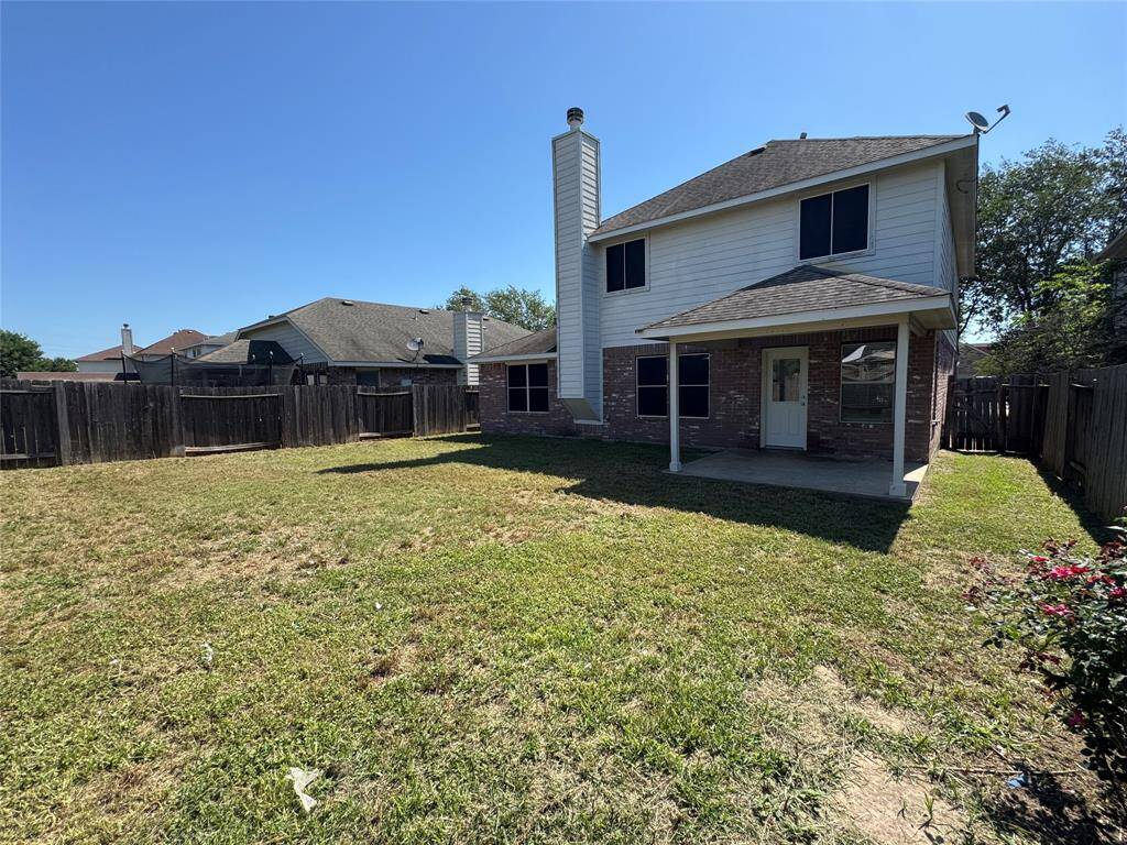 Other view of backyard and porch