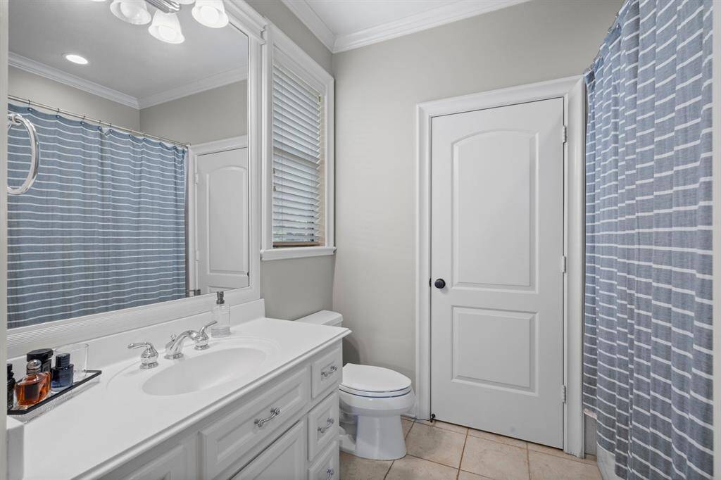 One of three secondary bathrooms upstairs.