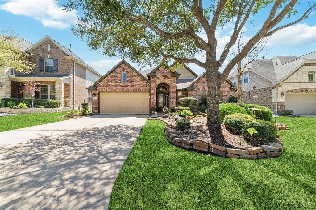 Discover your dream home at 6 Estherwood Place, The Woodlands, TX.