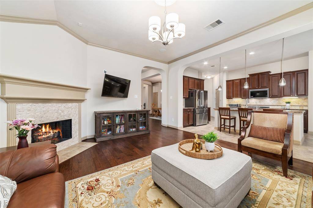 Enjoy seamless living with a kitchen that flows effortlessly into the family room.
