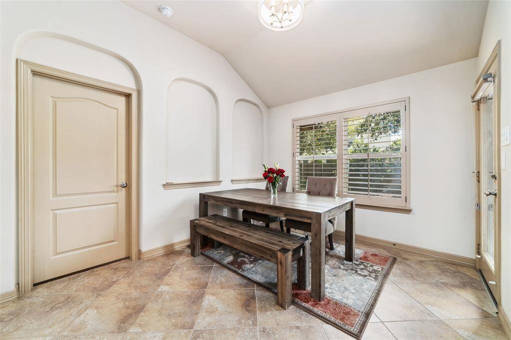 Spacious breakfast room with direct access to a covered patio.