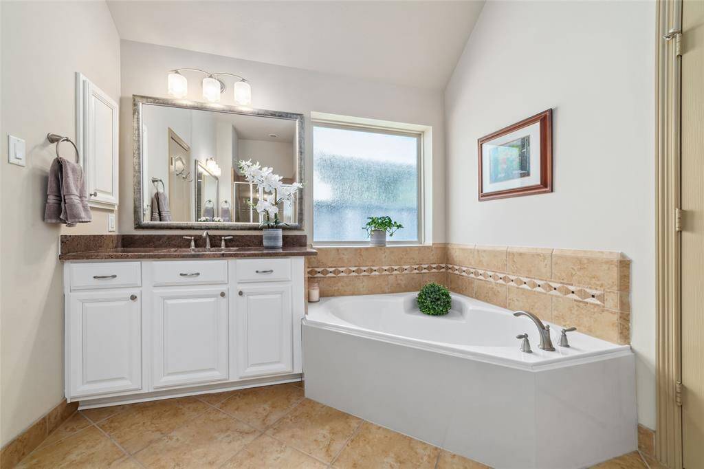 Relax in the luxurious soaking tub.