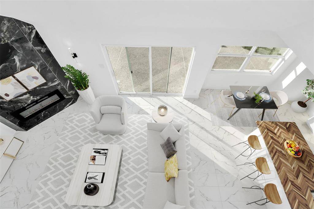 A view from above offers a stunning perspective of the incredible transformation below, showcasing the home's remarkable design and updates.(Virtually Staged)