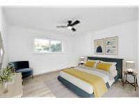 Each of the secondary bedrooms is designed with generous closets, ensuring ample storage.(Virtually Staged)