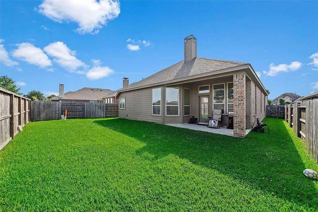 Back porch and back yard perfect for entertaining.  Schedule your private showing ASAP.