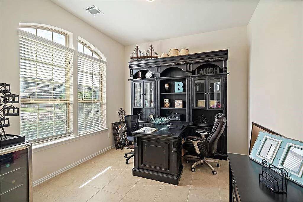 This is a 4 bedroom AND includes in home office with plenty of natural lighting.