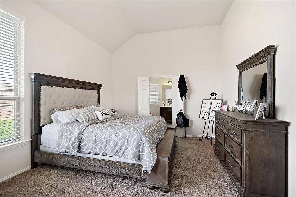 Primary bedroom with ensuite restroom.