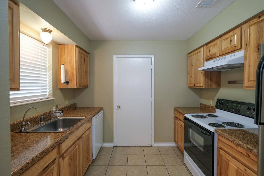 Kitchen with access to garage