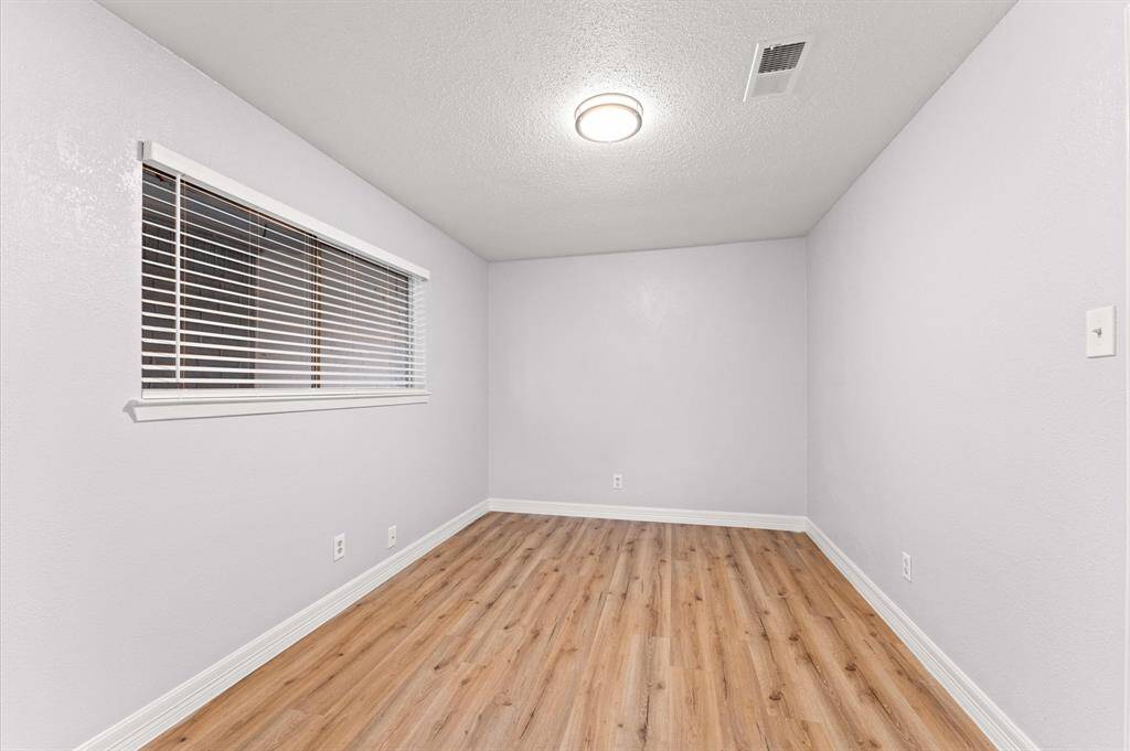 Bedroom 3 with its own half bathroom.
