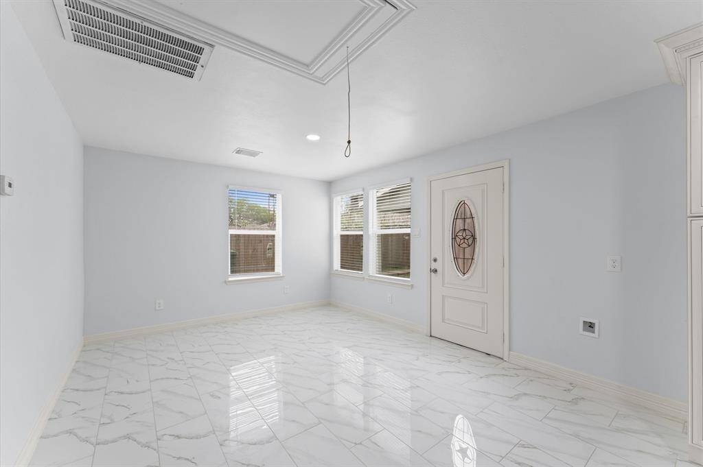 Living area open to kitchen in apartment 1