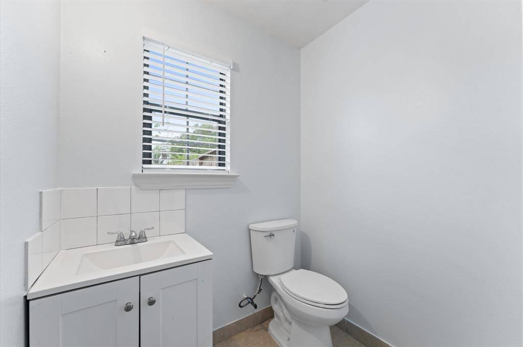 Full bathroom with standalone shower.