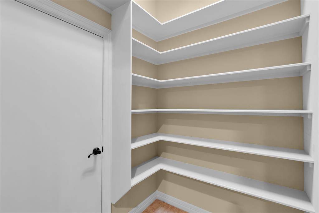 Large walk in pantry with extra space for small kitchen appliances