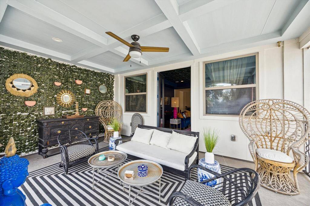 This inviting terrace features a large seating area perfect for entertaining or relaxing