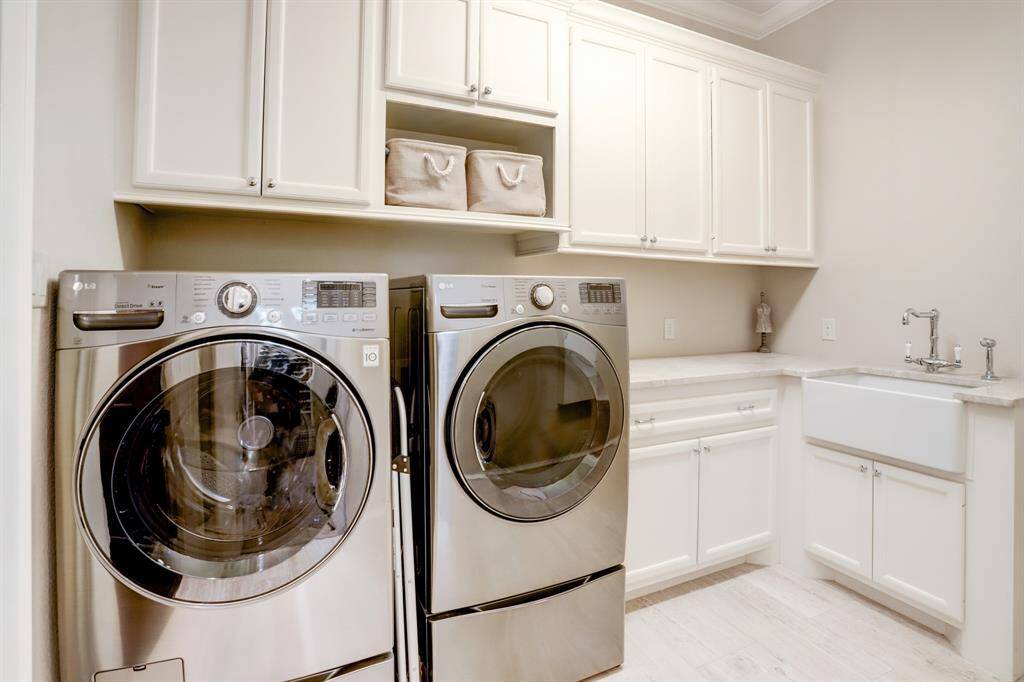 Downstairs laundry room just off the primary closet.