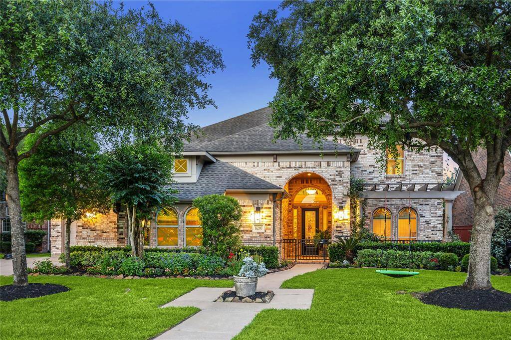 Exceptional 5/6 bedroom home with sparkling pool in sought-after gated community of lakes on Eldridge North.