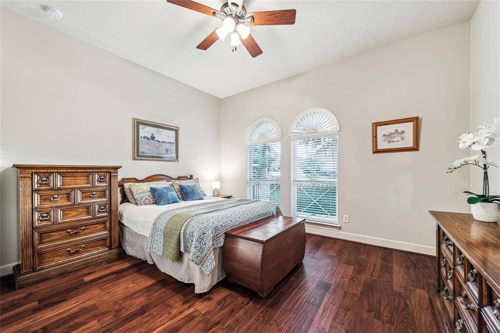 Versatile second bedroom downstairs, offering privacy and comfort with easy access to the main living areas.