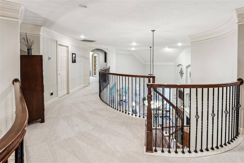 Bright second-floor landing featuring a versatile flex room and a cozy study nook, perfect for work, study, or additional living space, offering both privacy and convenience.