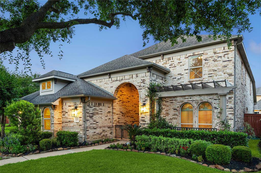 This exceptional 5-6 bedroom home offers a thoughtfully designed floor plan with soaring ceilings and stunning architectural details throughout.