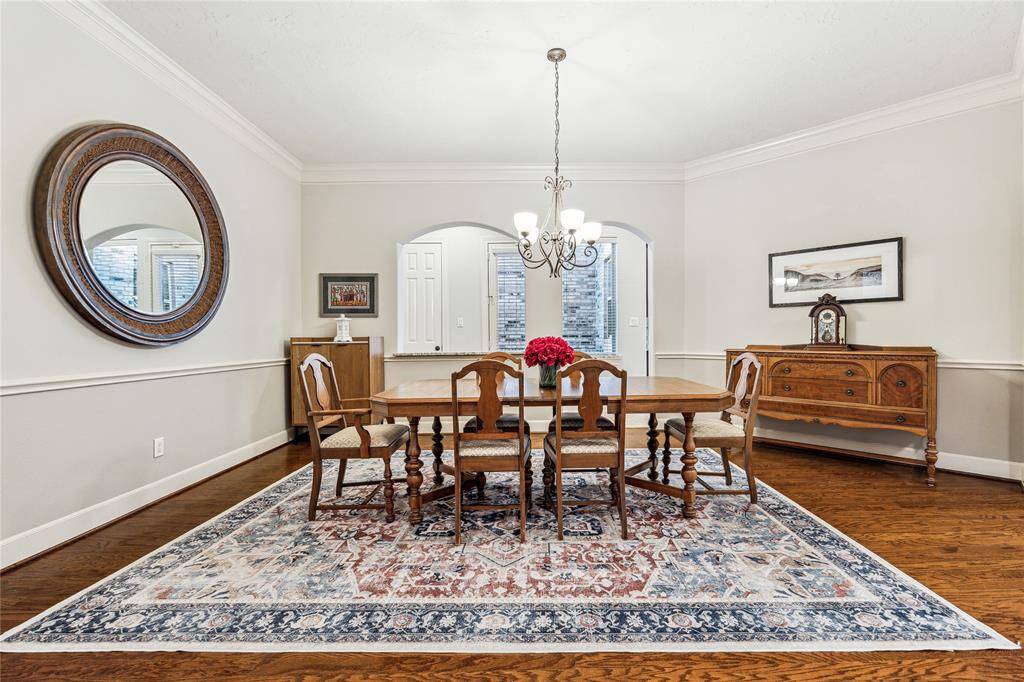 Bright and spacious formal dining room located at the front of the home, just off the private study—ideal for hosting with ease and elegance.
