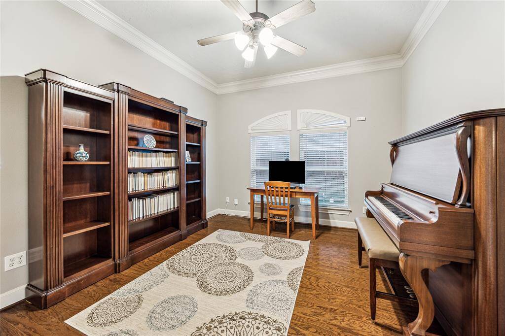 Private study with large windows that fill the space with natural light.