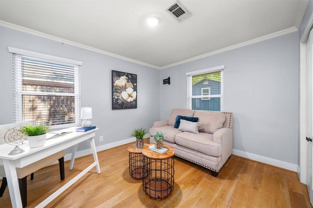 Bright & versatile—this room makes a perfect bedroom, guest space, home office, or cozy retreat.